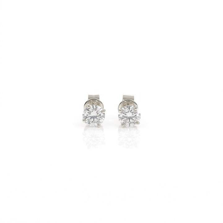 60-Brinco Solitário 2 Brilhantes 1,23ct H VS1/VVS2 2,30g Ouro Branco 18k - EGL 1601143016/1700382223 - Coleção Only You